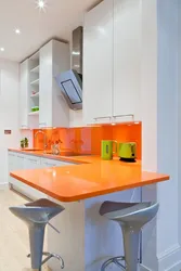 Kitchen With Colored Countertop Photo