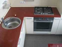 Stove And Sink In A Small Kitchen Photo