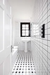 Bathtub With White Tiles And Gray Grout Photo