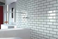 Bathtub with white tiles and gray grout photo