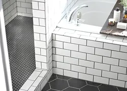 Bathtub With White Tiles And Gray Grout Photo