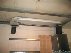 For a kitchen hood on the ceiling under a suspended ceiling photo