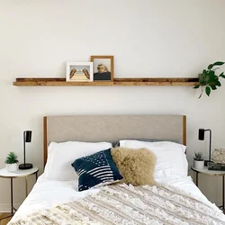 Shelves Above The Bed In The Bedroom Photo