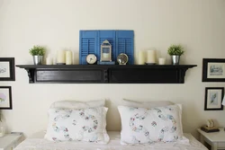 Shelves Above The Bed In The Bedroom Photo