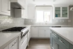 Kitchen With White Countertop And Apron In The Interior