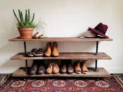Shoe shelves in the hallway made of wood, photos of your own