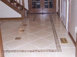 Porcelain tiles for flooring in the kitchen and hallway photo