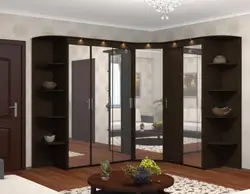 Corner wardrobes in the living room with a mirror photo
