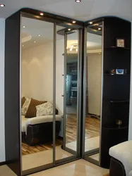 Corner Wardrobes In The Living Room With A Mirror Photo