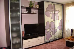 Living room wall with chest of drawers and wardrobe photo