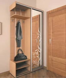 Hallway closet with mirror and hanger photo