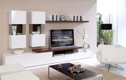 Modern Shelves On The Wall In The Living Room With TV Photo