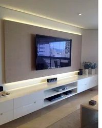 Modern Shelves On The Wall In The Living Room With TV Photo