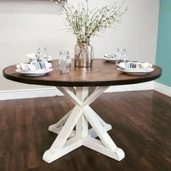 Round table for the kitchen on one leg in the interior