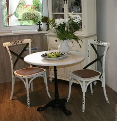 Round Table For The Kitchen On One Leg In The Interior
