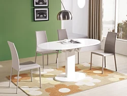 Round table for the kitchen on one leg in the interior
