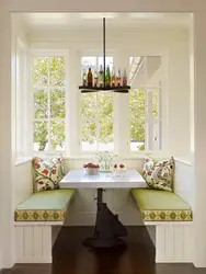 Photo Of A Kitchen With A Dining Table By The Window