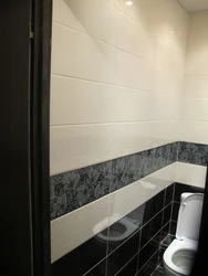 Photo Of A Bathroom With A Dark Bottom