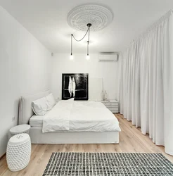 White wall color in the bedroom interior