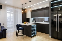 Refrigerator in the interior of the kitchen living room design
