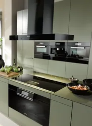 Black Household Appliances In The Kitchen Interior