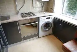 Kitchen design with refrigerator and washing machine photo