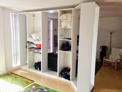 Wardrobe in a one-room apartment photo