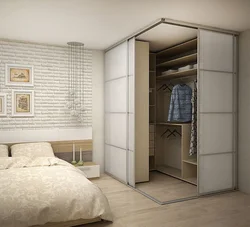 Wardrobe in a one-room apartment photo