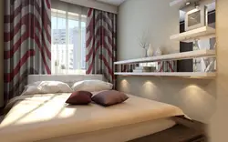 Bedroom design with a window along a long wall