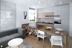 Дизайн кухни в серых тонах с диваном