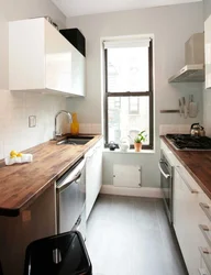 Design of a narrow kitchen with a 2 by 4 window