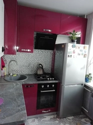 Kitchen 5 square meters design with a Khrushchev refrigerator and a column