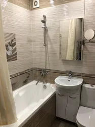 Photo of the bathroom in the apartment with real tiles