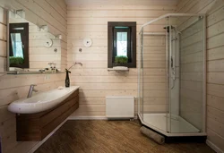 Bathroom design in a wooden house with shower