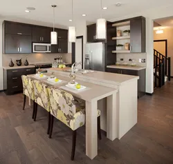 Island in the kitchen photo with dining area