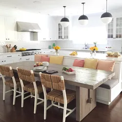 Island in the kitchen photo with dining area