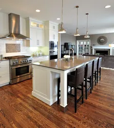 Island in the kitchen photo with dining area