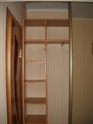Narrow sliding wardrobe in the hallway depth 40 cm photo