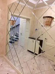 Design With Mirrors On All Walls In The Hallway