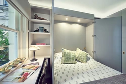 Interior Of A Small Bedroom With One Bed