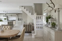 Kitchen With Stairs To The Second Floor Design Photo