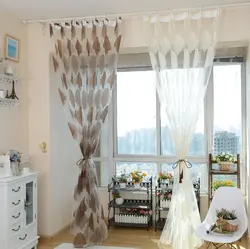 Tulle and curtains in the kitchen living room photo