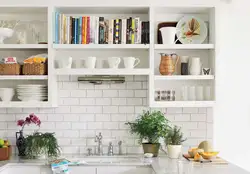 Photo of a kitchen with shelves and cabinets on the wall