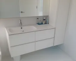 Sink with bathroom cabinet photo