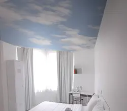 Matte white stretch ceiling in the bedroom photo