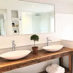 Design Of A Bathtub With A Countertop Under The Sink In The Bathroom