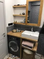 Design of a bathtub with a countertop under the sink in the bathroom