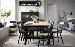 Kitchen interior with black table and chairs photo