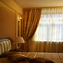 Ceiling cornice in the bedroom interior photo