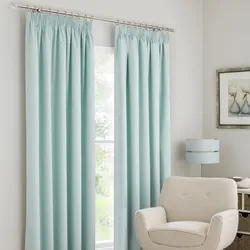 Mint curtains in the kitchen interior photo